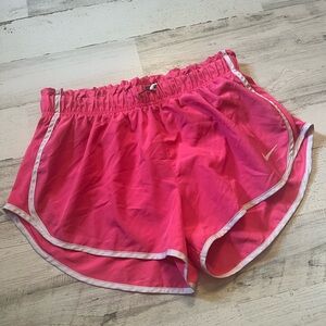 Nike hot pink running shorts with liner